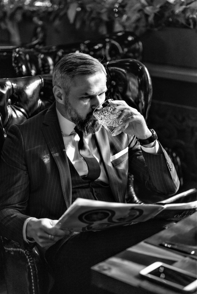 A gentleman having a drink with Edwige International